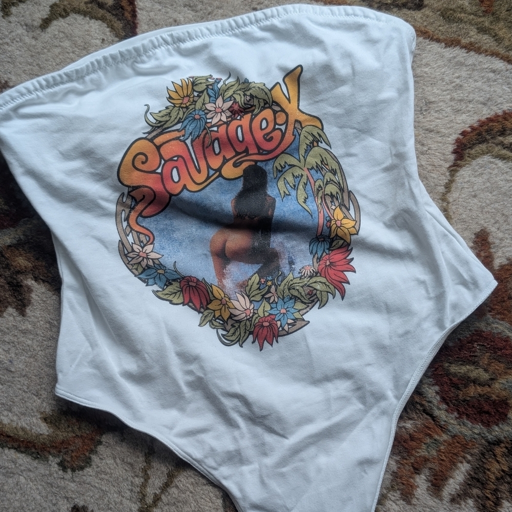 Savage X Graphic Bodysuit And Lace Bell Bottom Pants.